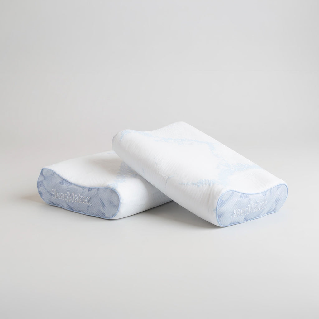 SleepMaker Advanced Collection pillows stacked on a light gray background